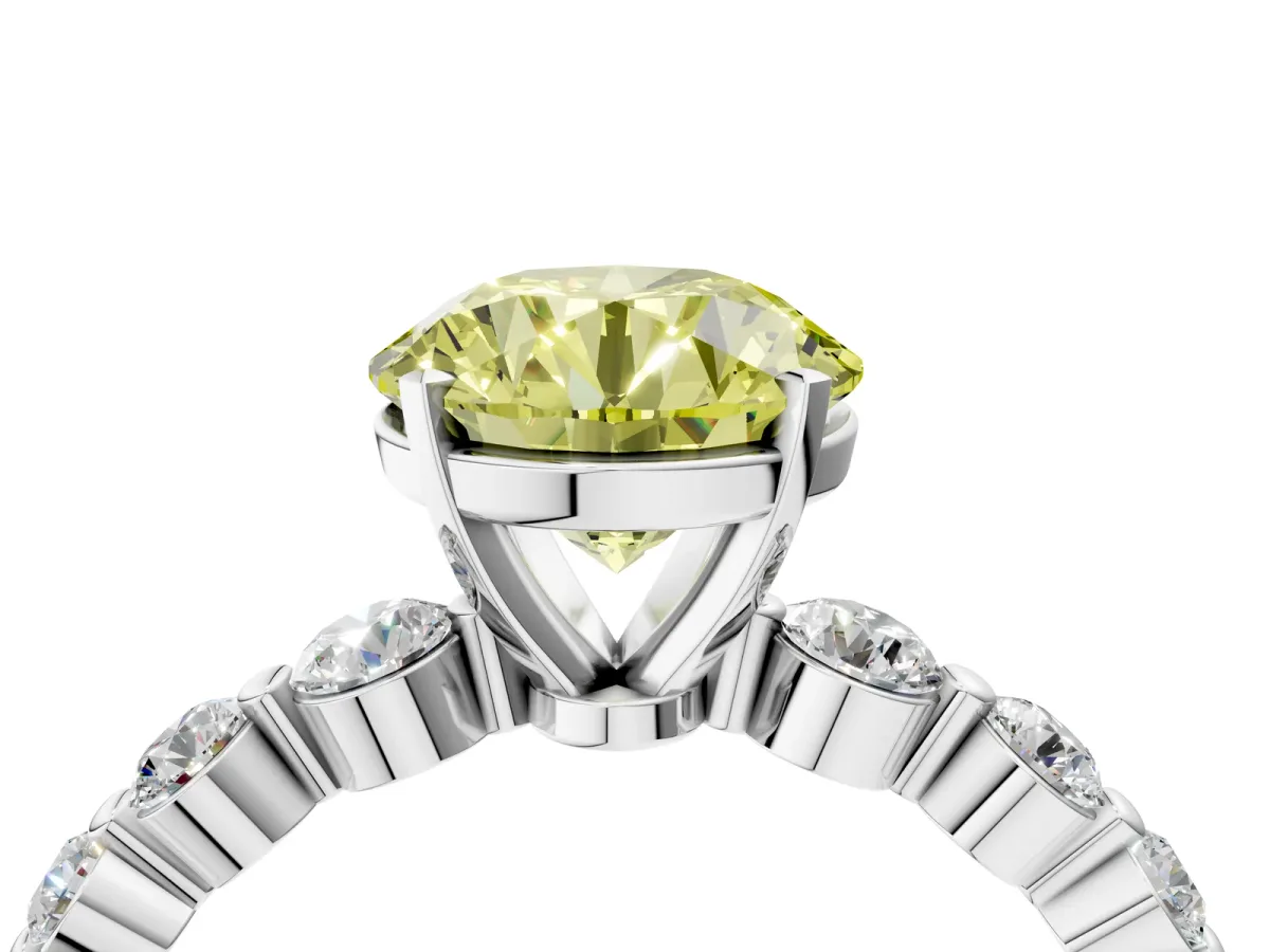 Fancy Yellow Round Cut Solitaire Diamond Ring with Pave Band and Four-Prong Setting Platinum
