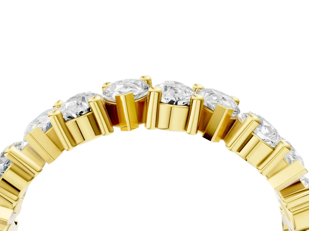 Pear Diamond Shared Prong Eternity Band Yellow gold