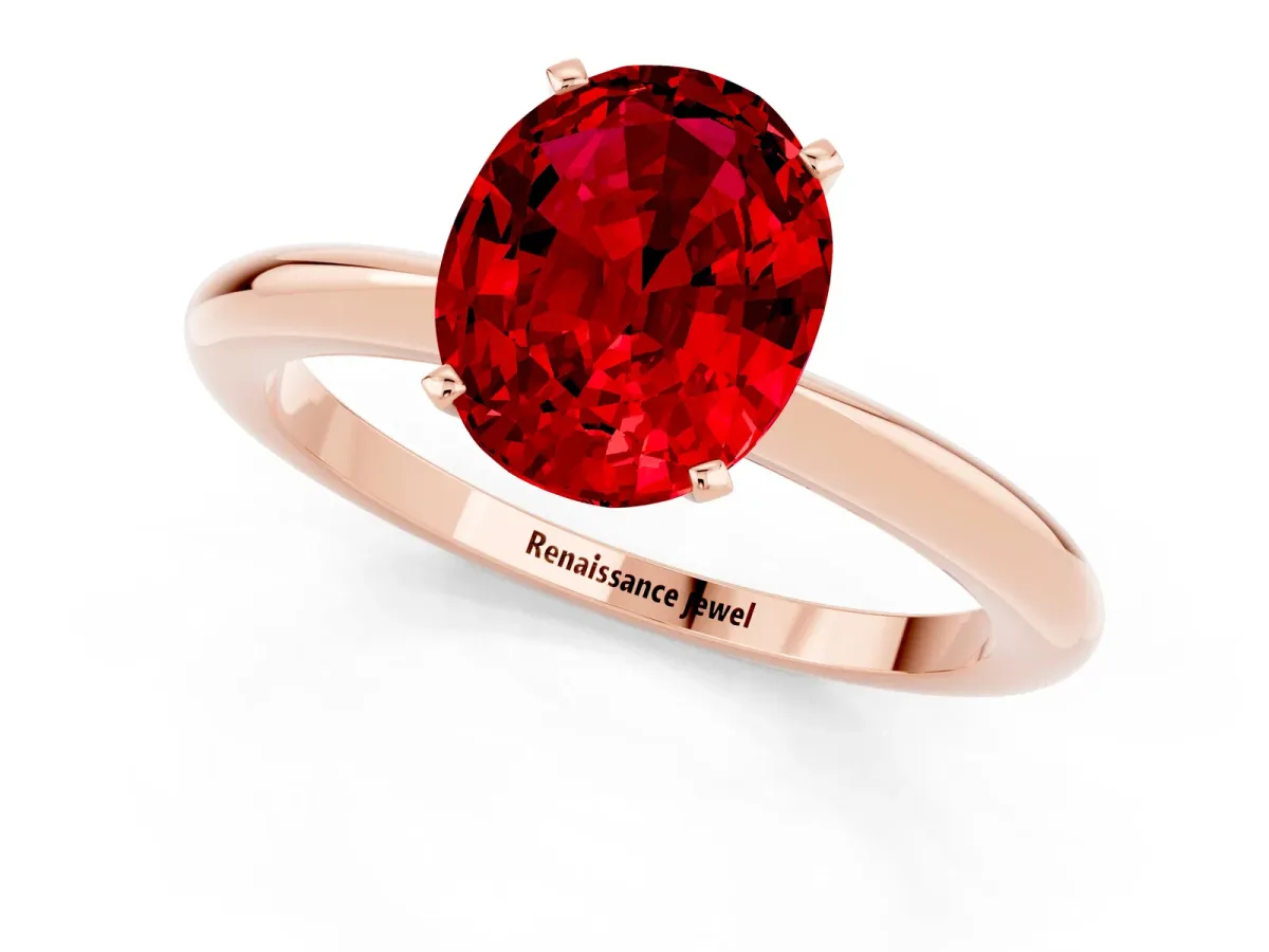 Oval Cut Ruby Solitaire Ring with Six-Prong Setting and Classic Band Rose gold