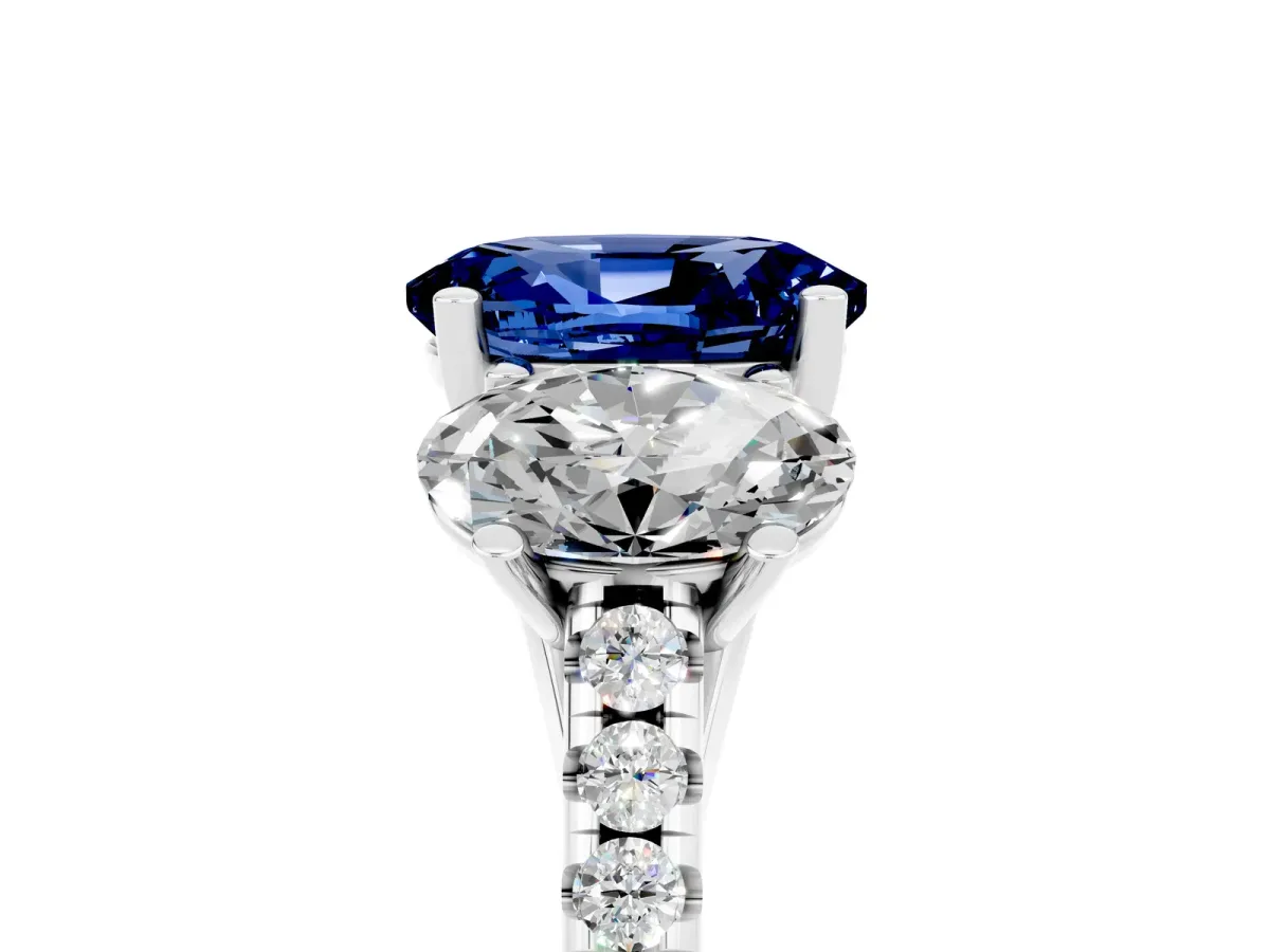 Three-Stone Oval Cut Blue Sapphire Ring with Round Pavé Band and Prong Setting Silver