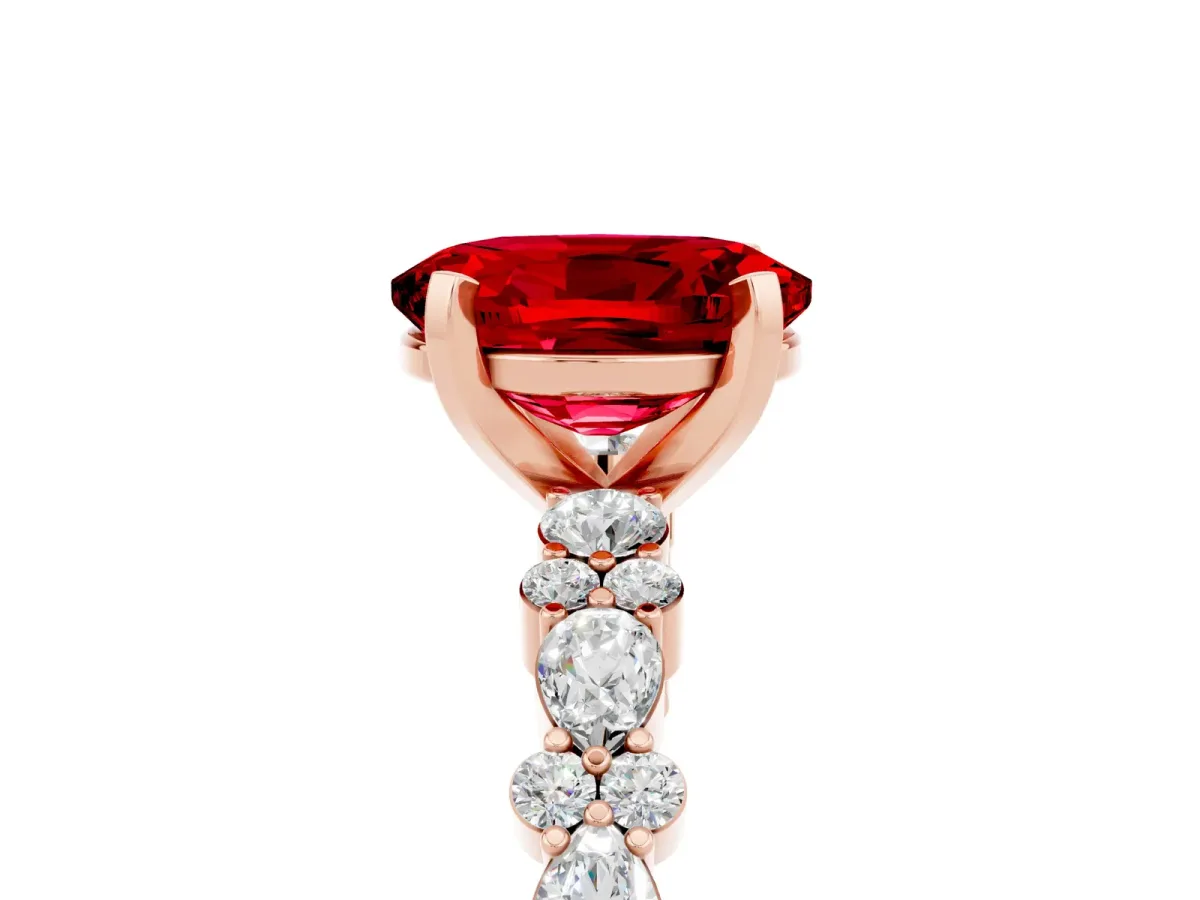 Oval Cut Ruby Side Stone Solitaire Ring with Round and Four-Prong Setting Rose gold