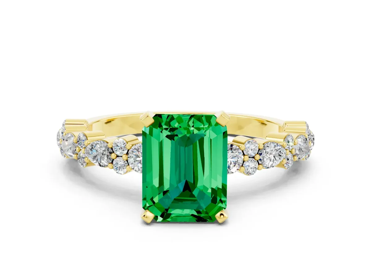 Emerald Cut Emerald Side Stone Solitaire Ring with Round and Four-Prong Setting Yellow gold