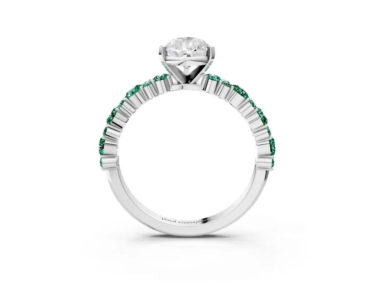 Pear Cut Diamond Side Stone Solitaire Ring with Round Green Sapphire and Four-Prong Setting Silver