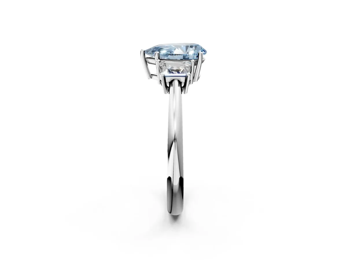 Fancy Blue Pear Cut Diamond Three-Stone Ring with Trapezoid Side Stones and Prong Setting Platinum