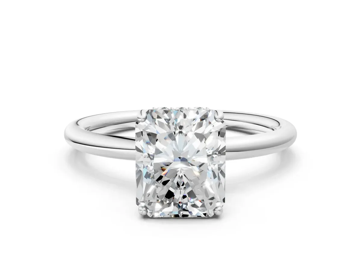 Radiant Cut Solitaire Diamond Ring with a Classic Band and Four-Prong Setting Platinum