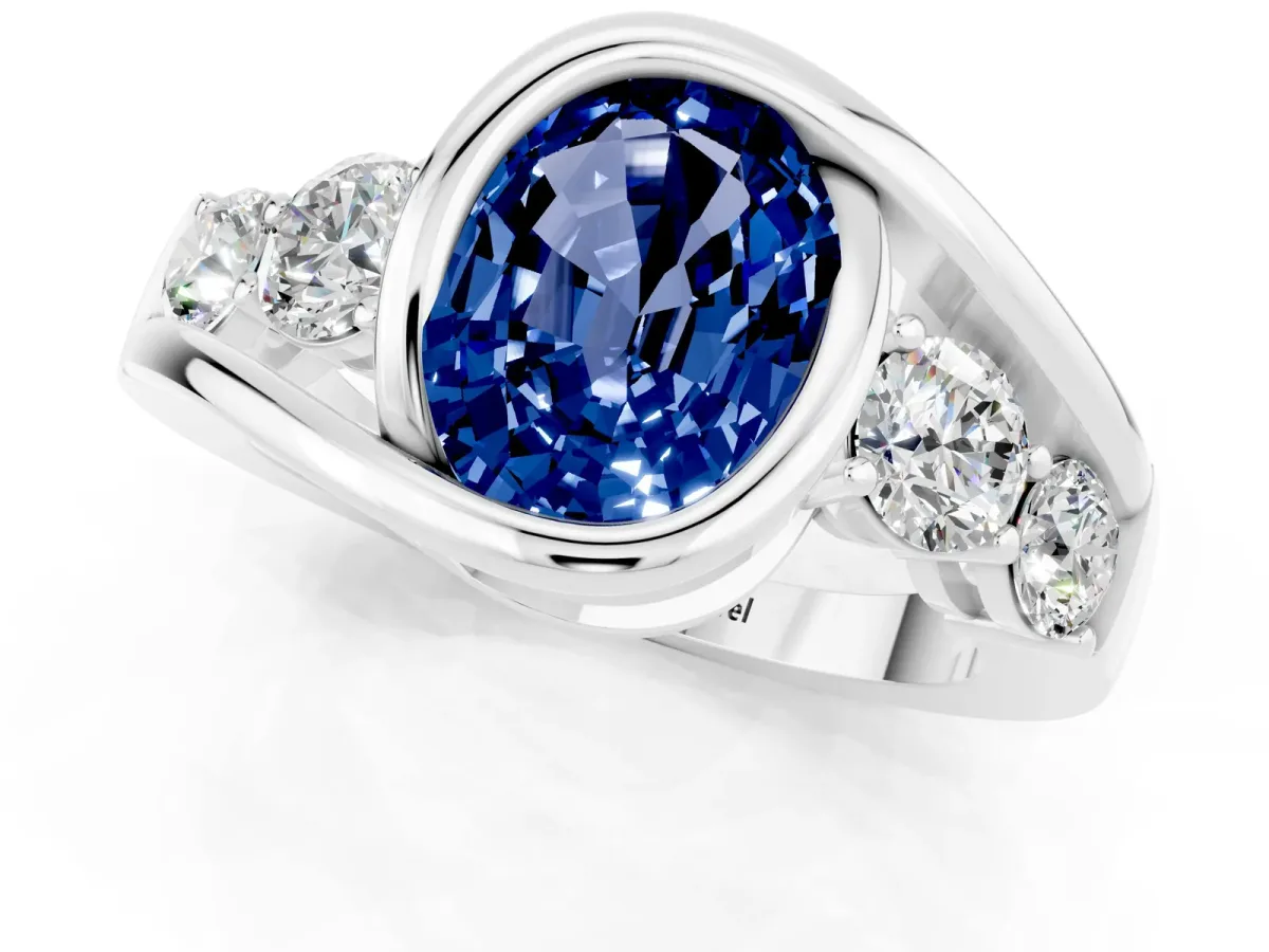 Bezel Set Oval Cut Blue Sapphire Bypass Ring with Round Accents Platinum