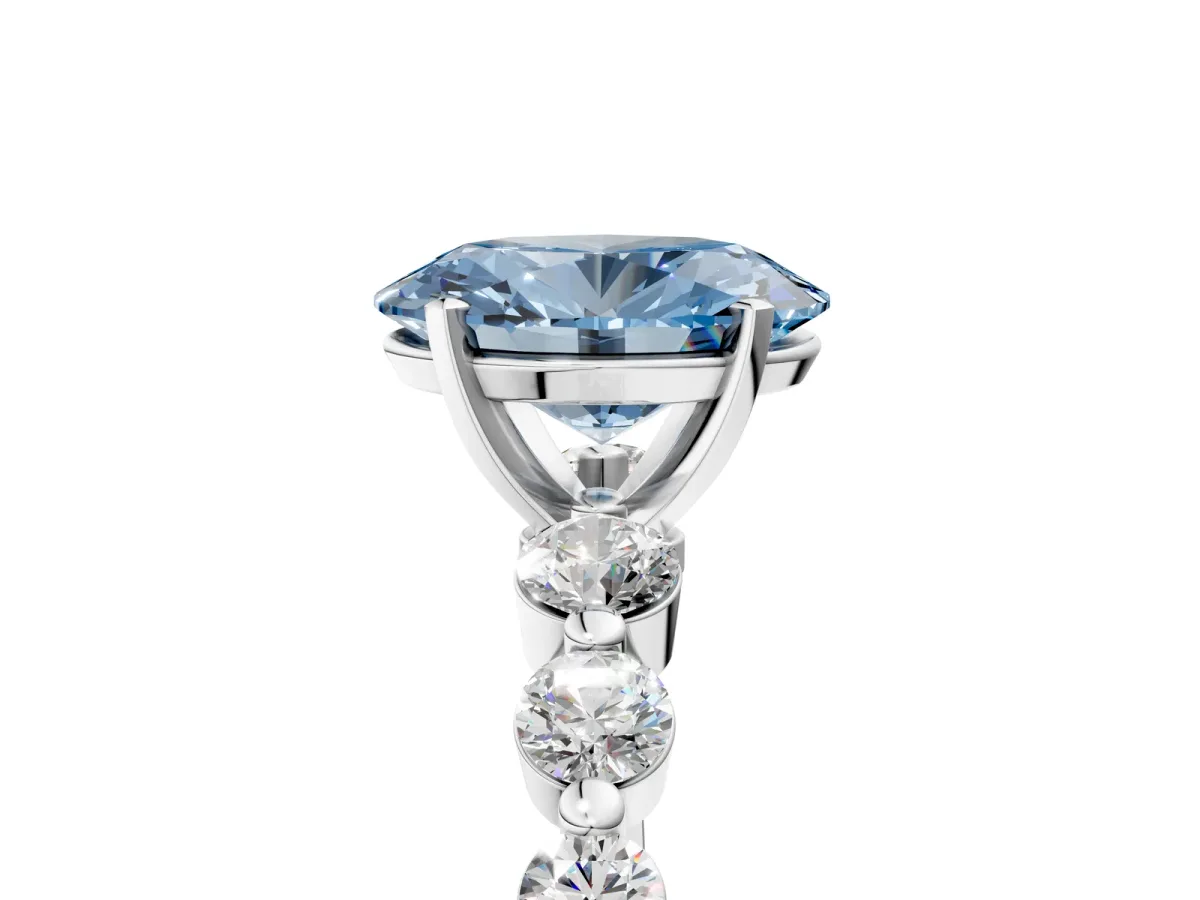Fancy Blue Oval Cut Solitaire Diamond Ring with Pave Band and Four-Prong Setting Platinum