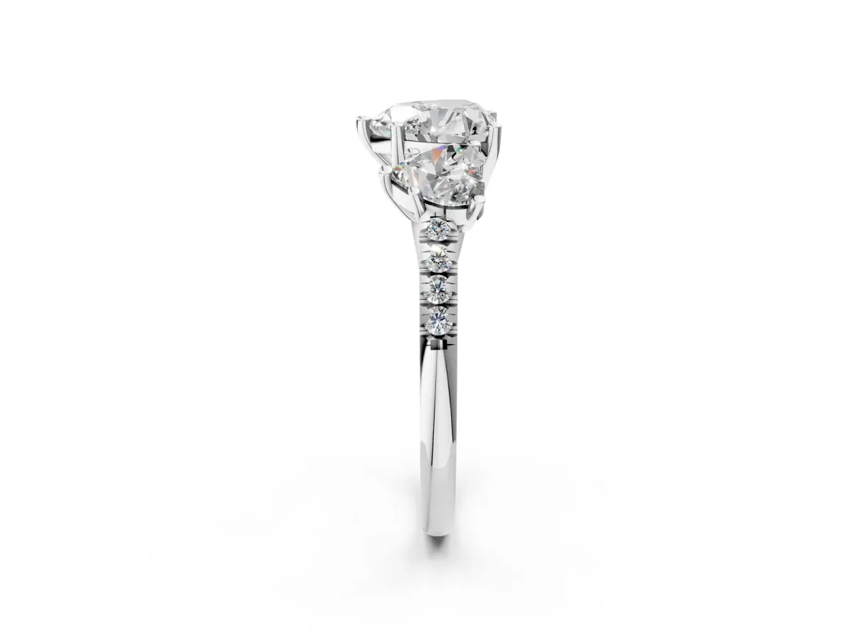 Three-Stone Heart Cut Diamond Ring with Round Pavé Band and Prong Setting Platinum