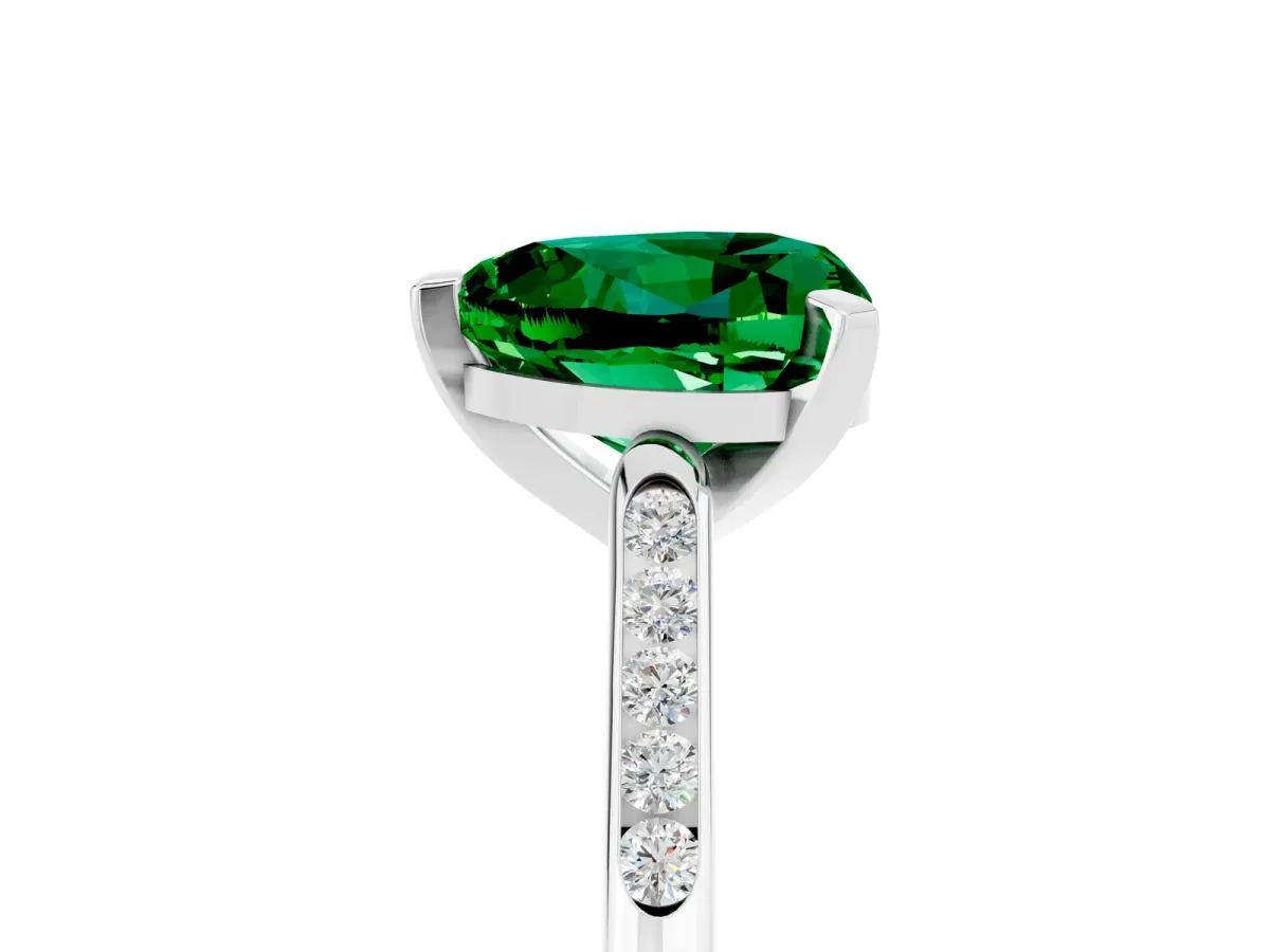 Heart Cut Emerald Solitaire Ring with Channel Set Round Band and Prong Setting Silver