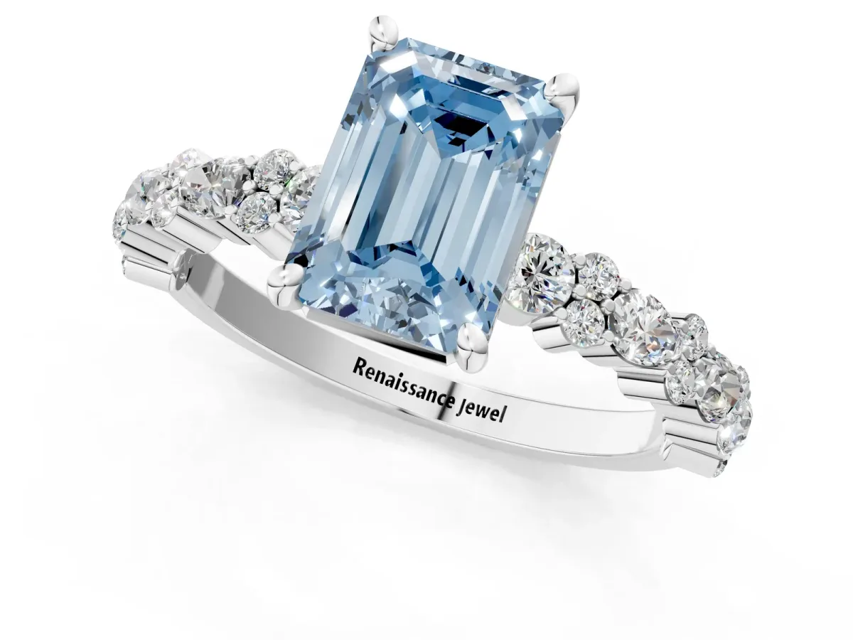 Fancy Blue Emerald Cut Diamond Side Stone Solitaire Ring with Round and Four-Prong Setting Platinum