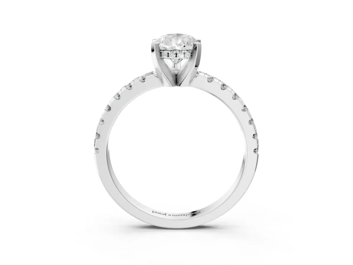 Pear Cut Diamond Solitaire Ring with Round Pavé Band and Four-Prong Setting Platinum