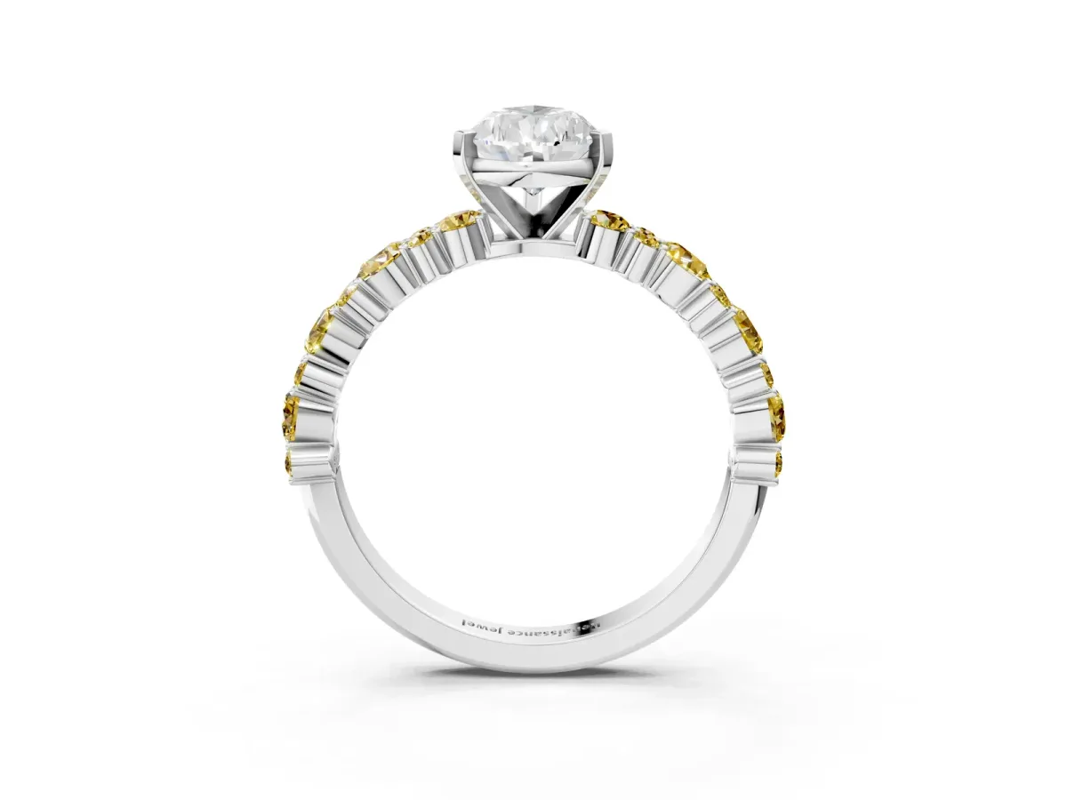 Pear Cut Diamond Side Stone Solitaire Ring with Round Yellow Sapphire and Four-Prong Setting Silver