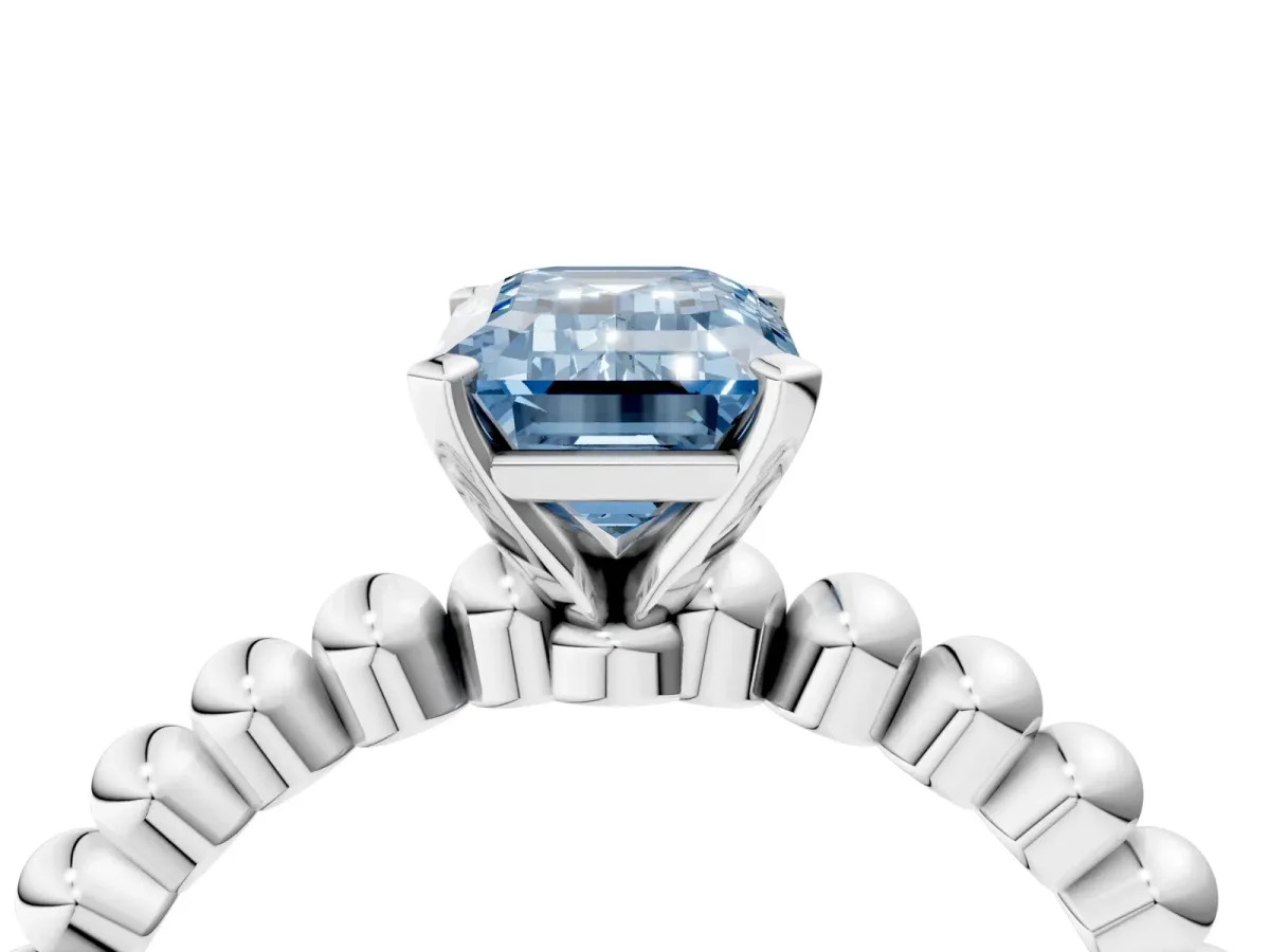 Fancy Blue Emerald Cut Diamond Solitaire Ring with Beaded Band and Prong Setting Silver