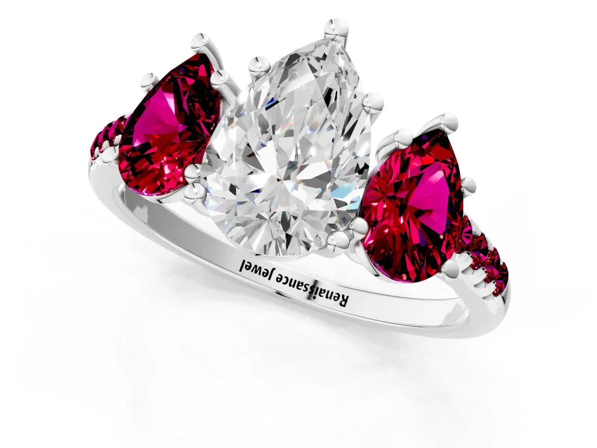 Three-Stone Pear Cut Diamond Ring with Round Garnet Pavé Band and Prong Setting Platinum