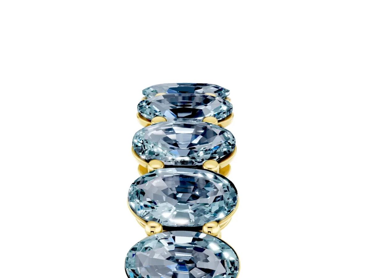 Oval Cut Aquamarine Eternity Band with Shared Prong Setting Yellow gold