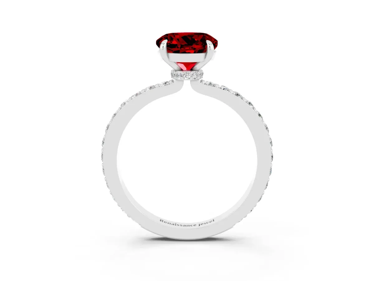 Round Cut Ruby Solitaire Engagement Ring with Pavé Band and Four-Prong Setting Silver