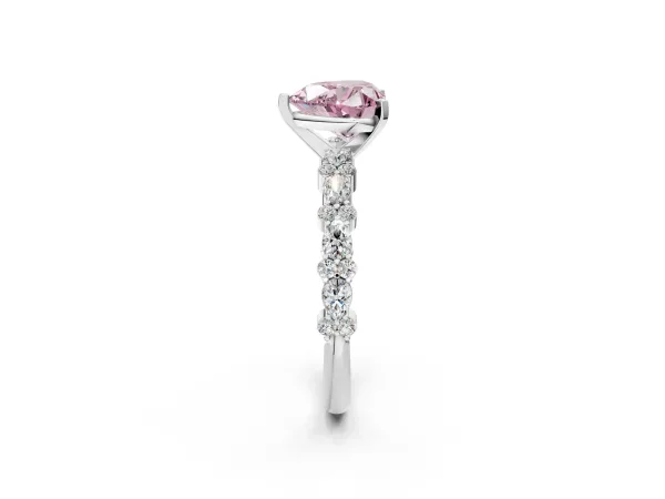 Fancy Pink Heart Cut Diamond Side Stone Solitaire Ring with Round and Four-Prong Setting Platinum