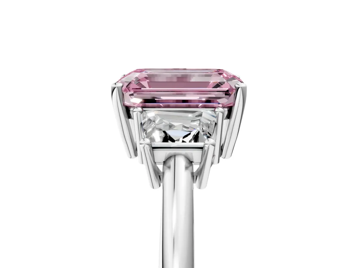 Fancy Pink Emerald Cut Diamond Three-Stone Ring with Trapezoid Side Stones and Prong Setting Platinum