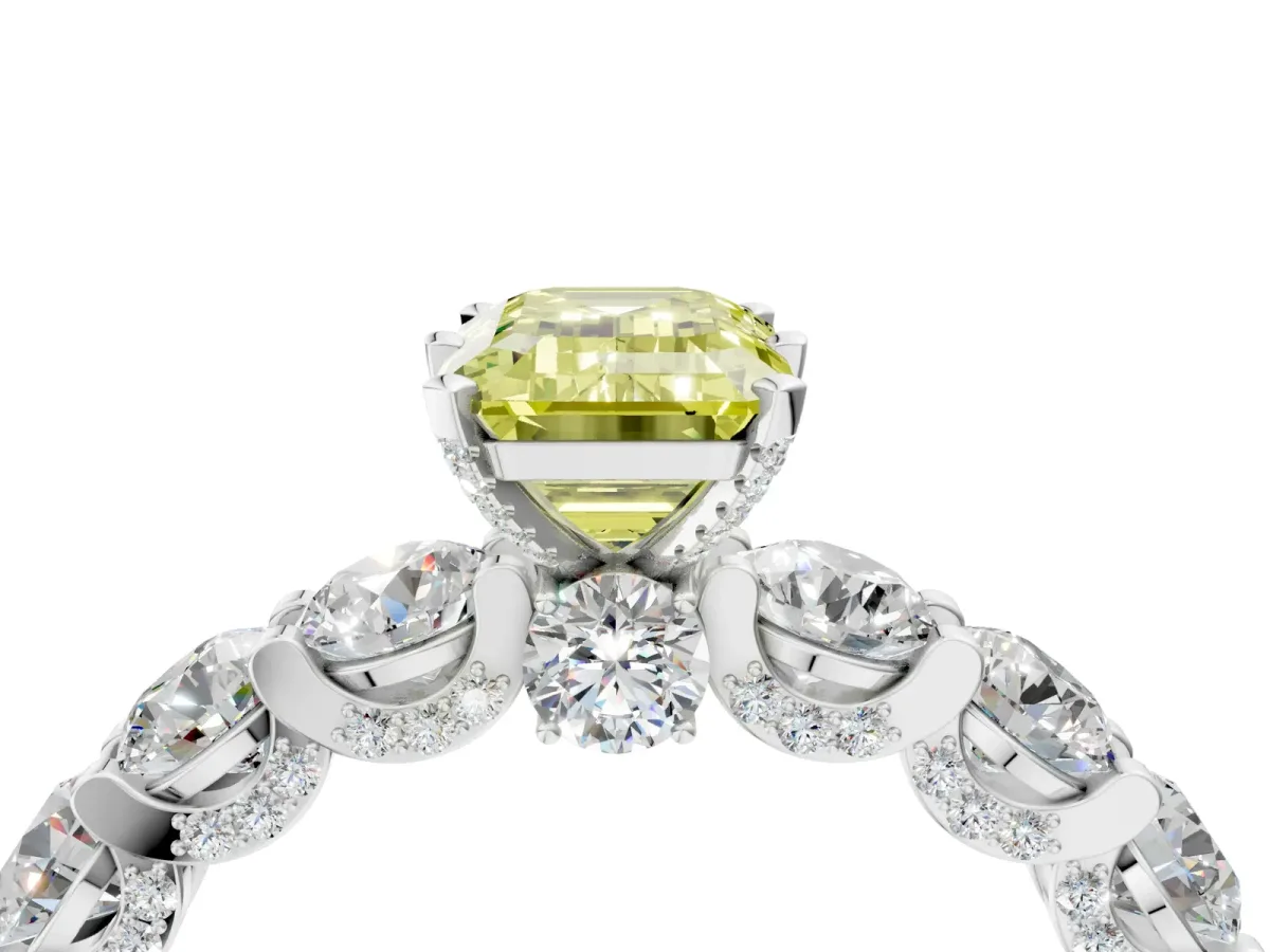 Fancy Yellow Emerald Cut Diamond Side Stone Engagement Ring with Four-Prong Setting White gold