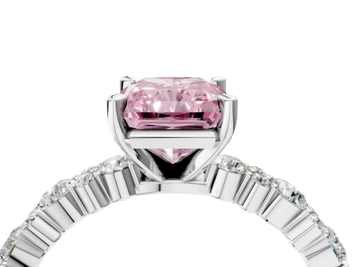 Fancy Pink Radiant Cut Diamond Side Stone Solitaire Ring with Round and Four-Prong Setting Platinum