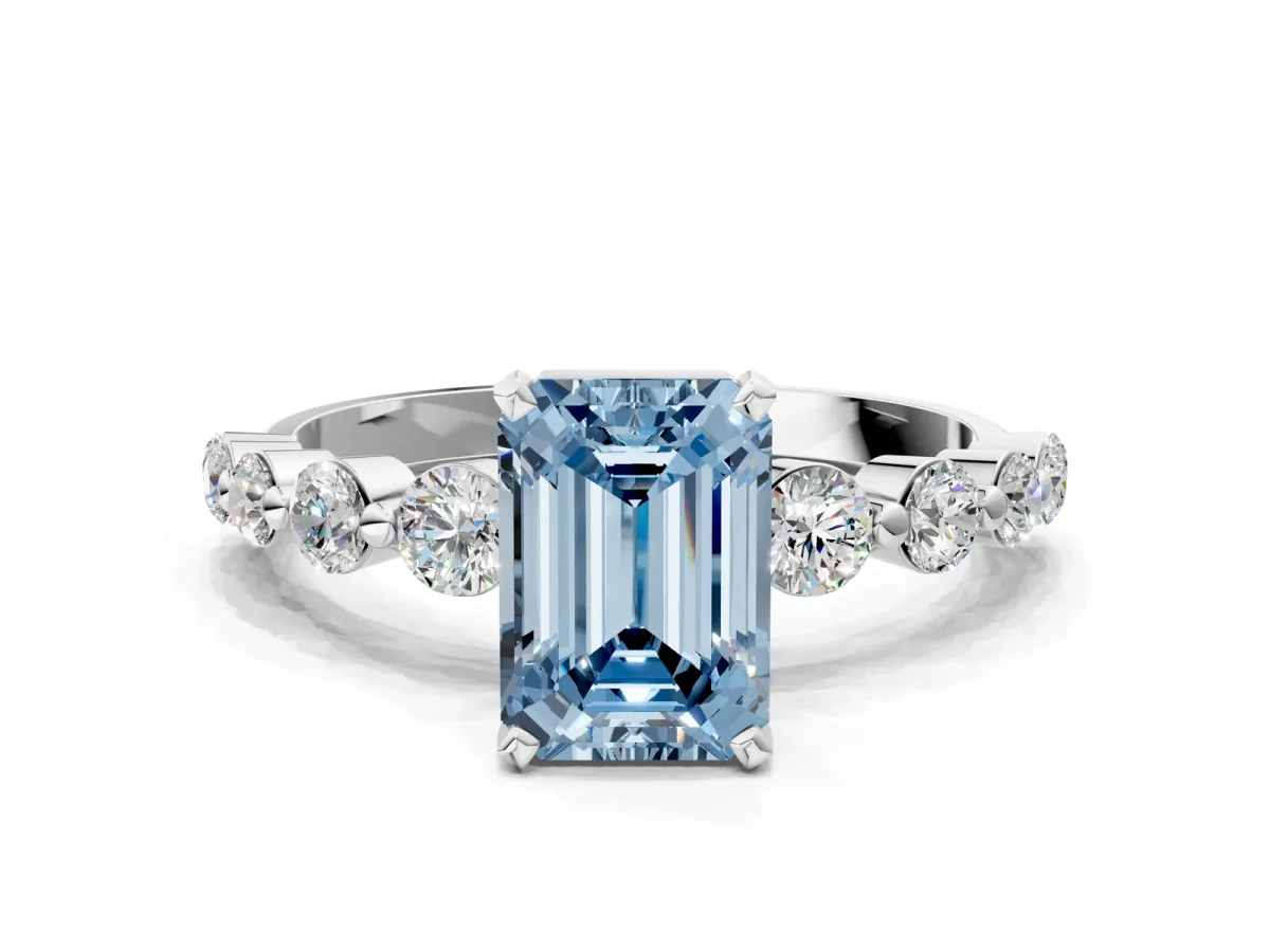 Fancy Blue Emerald Cut Solitaire Diamond Ring with Pave Band and Four-Prong Setting Silver