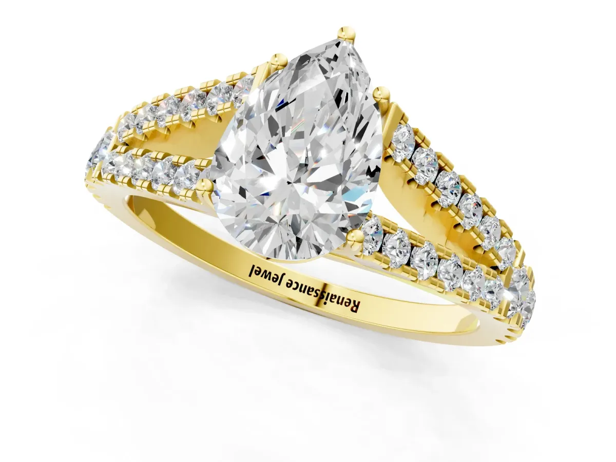 Pear Cut Diamond Split Shank Pavé Engagement Ring with Four-Prong Setting Yellow gold