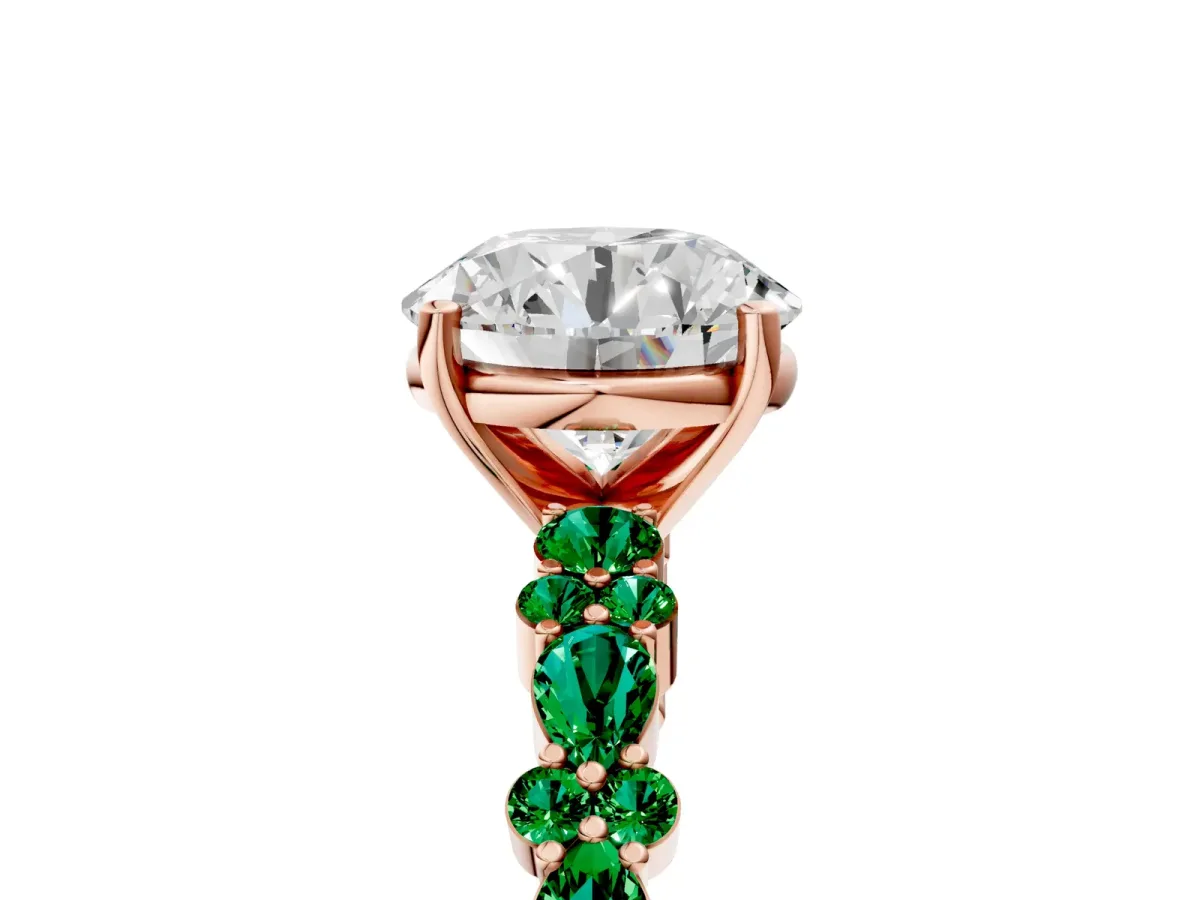 Round Cut Diamond Side Stone Solitaire Ring with Round Emerald and Four-Prong Setting Rose gold