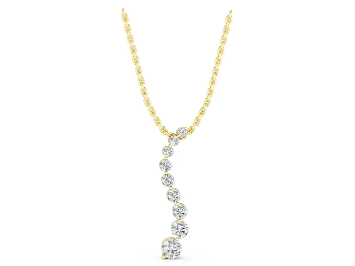 Round Diamond Graduated Prong Set Pendant Yellow gold