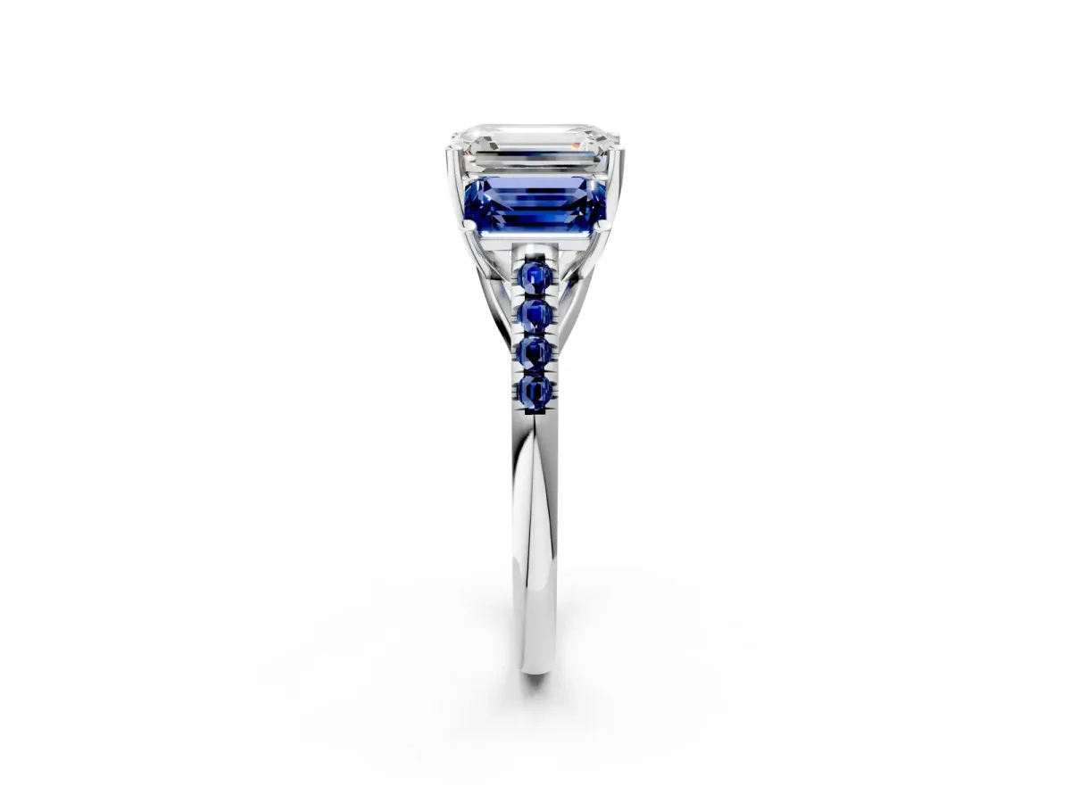 Three-Stone Emerald Cut Diamond Ring with Round Blue Sapphire Pavé Band and Prong Setting Silver