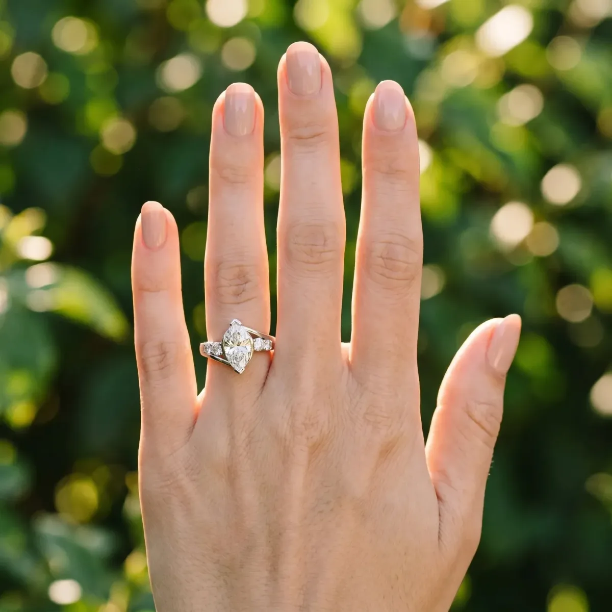 Bezel Set Marquise Cut Diamond Bypass Ring with Round Accents Silver
