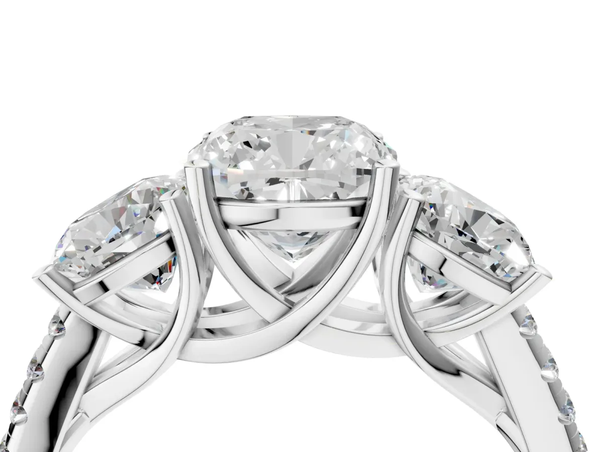 Three-Stone Cushion Cut Diamond Ring with Round Pavé Band and Prong Setting Platinum
