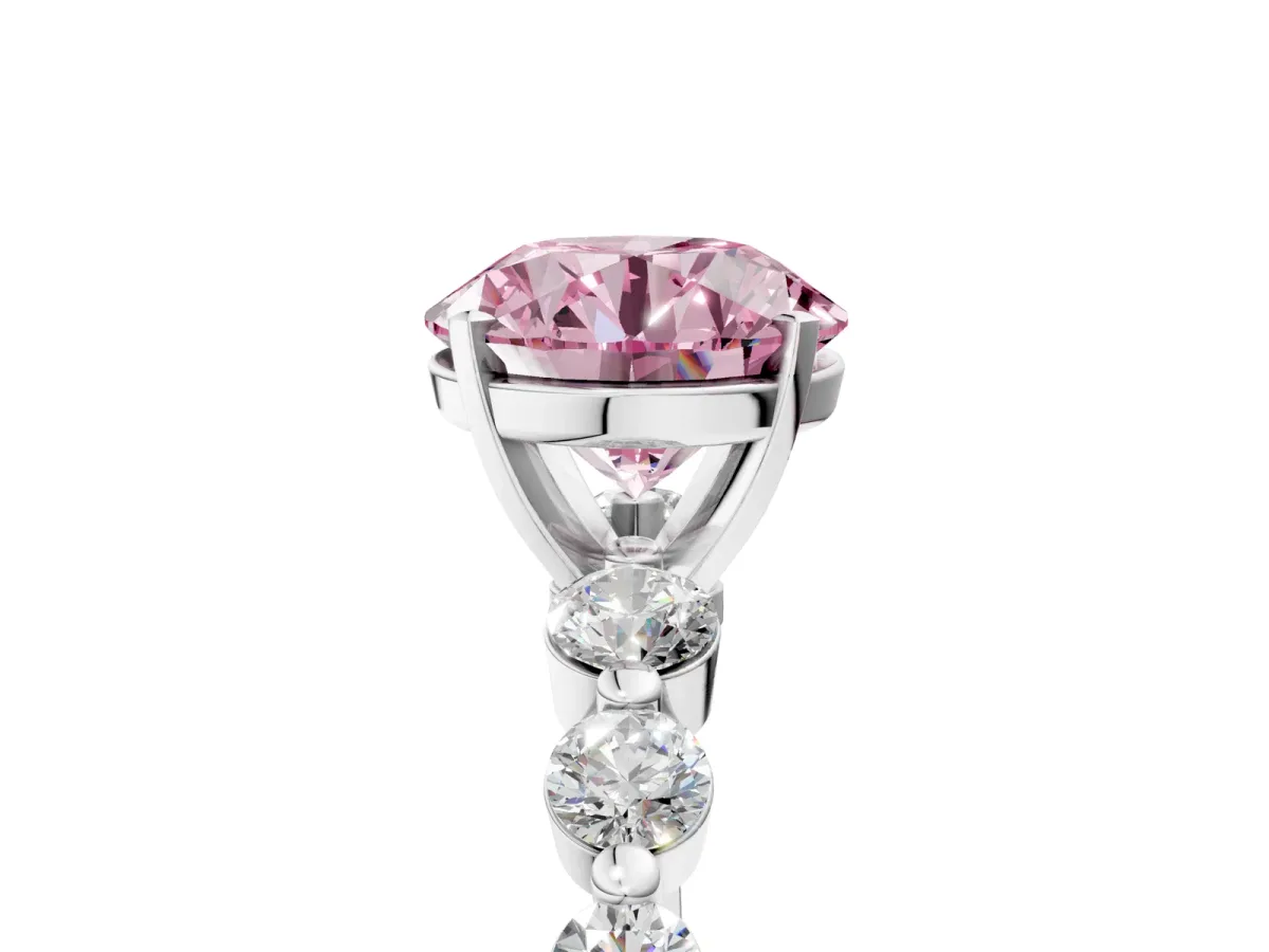 Fancy Pink Round Cut Solitaire Diamond Ring with Pave Band and Four-Prong Setting Silver