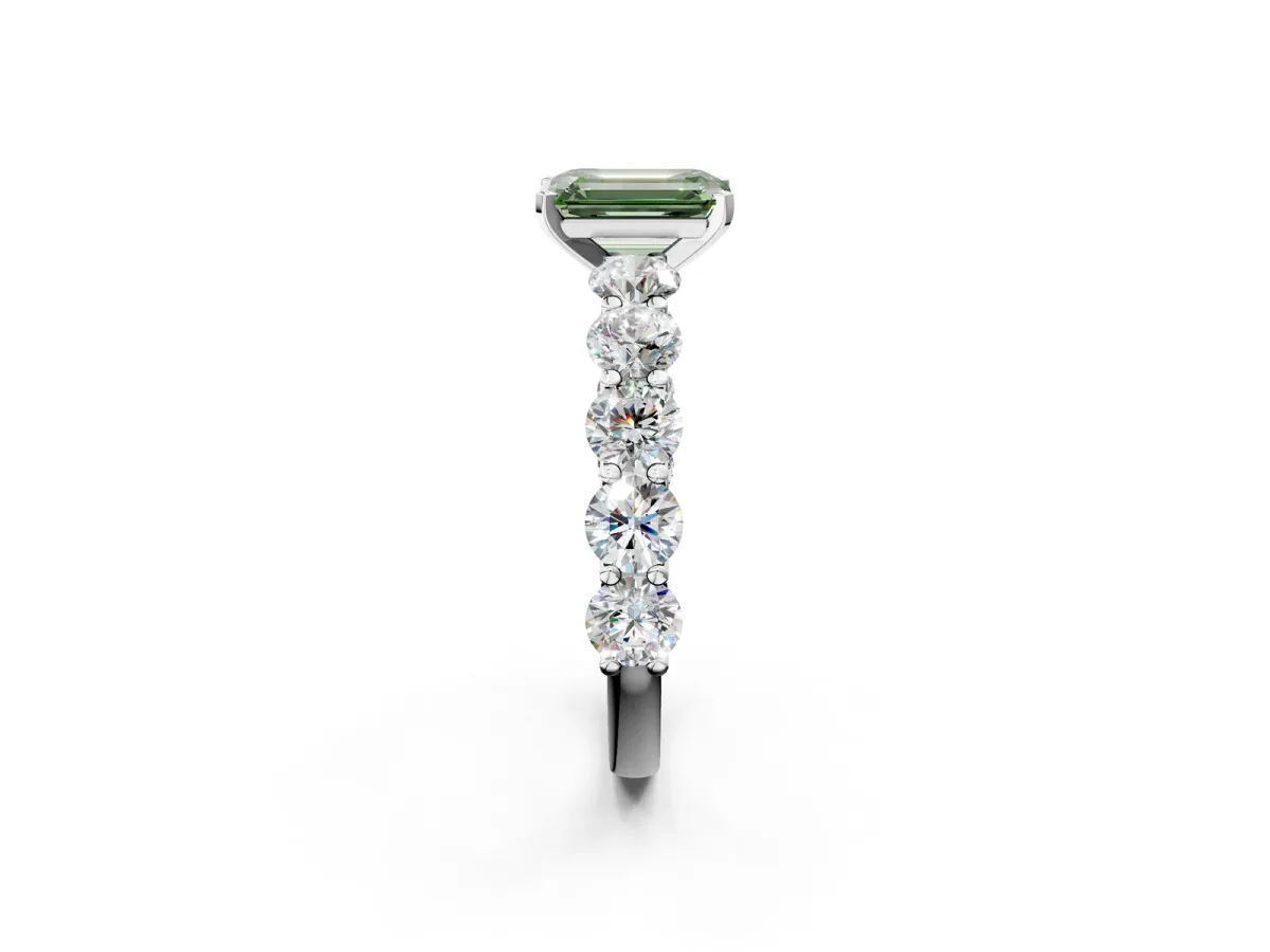 Fancy Green Emerald Cut Diamond Prong Setting with Side Stones on a Pave Band Silver