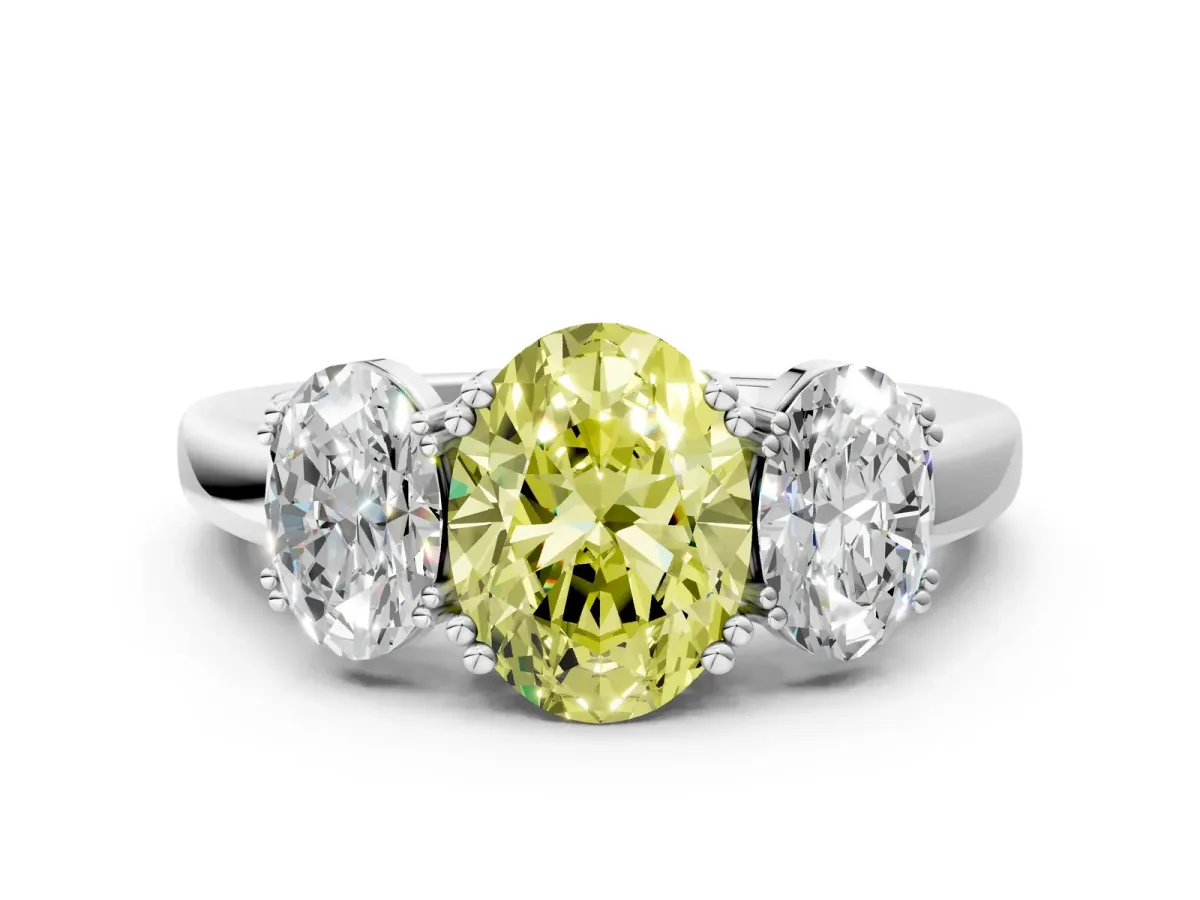 Fancy Yellow Three-Stone Oval Cut Cut Diamond Ring with Channel Set Band and Four-Prong Setting Silver
