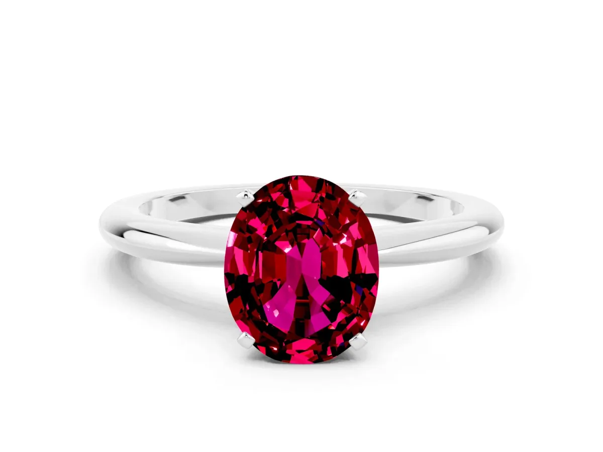 Oval Cut Garnet Solitaire Ring with Six-Prong Setting and Classic Band Silver