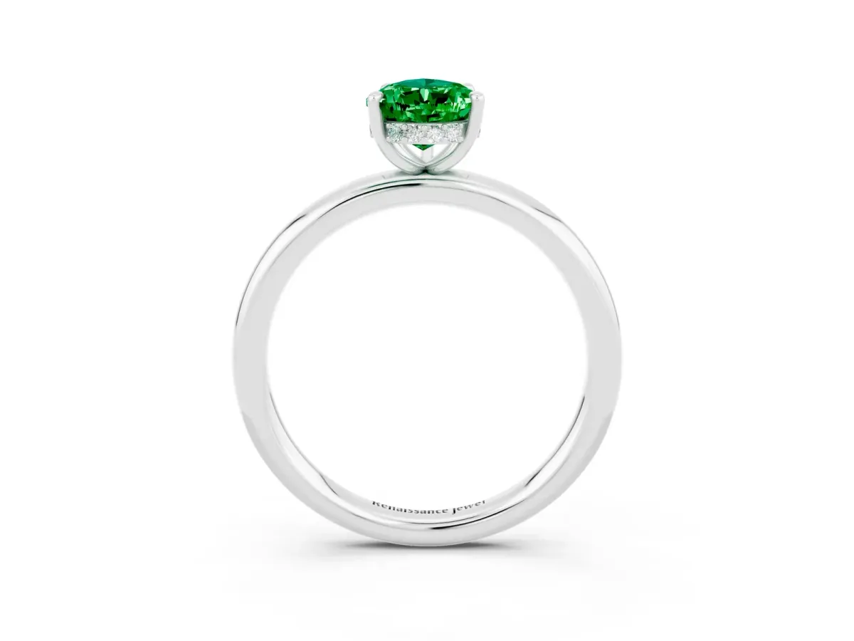 Pear Cut Emerald Solitaire Ring with Thin Band and Four-Prong Setting Silver