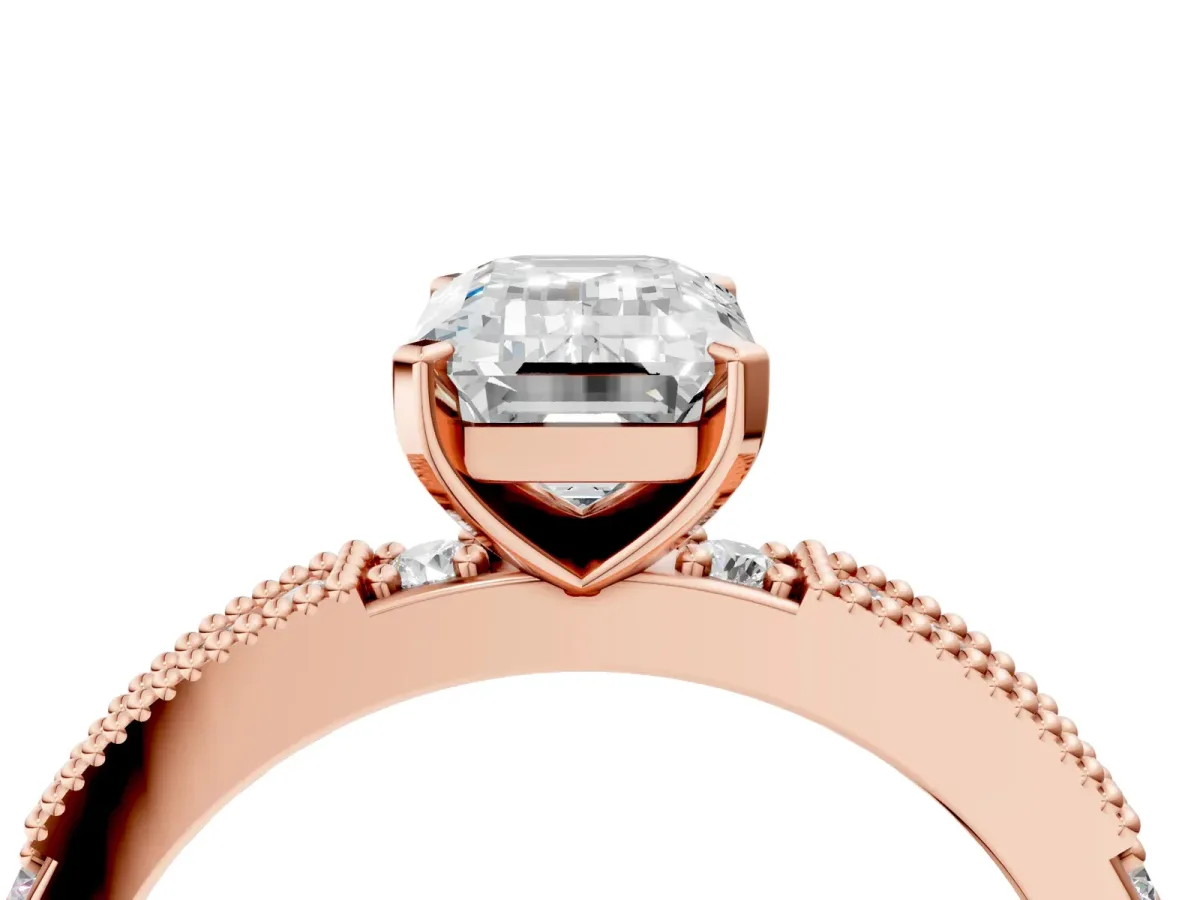 Emerald Cut Solitaire with Pavé Band and Four-Prong Setting Rose gold