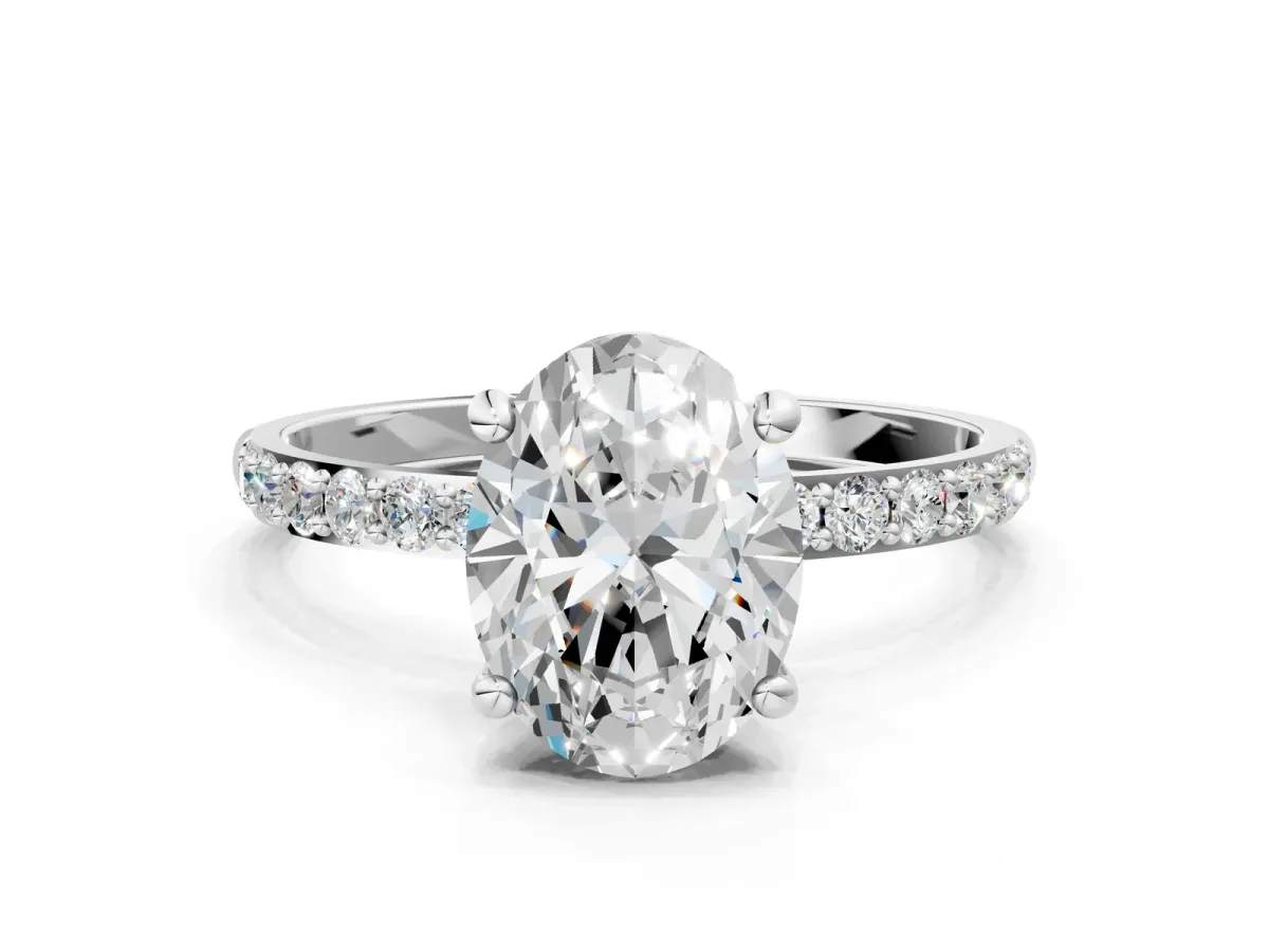 Oval Cut Diamond Solitaire Ring with Round Pavé Band and Prong Setting Silver