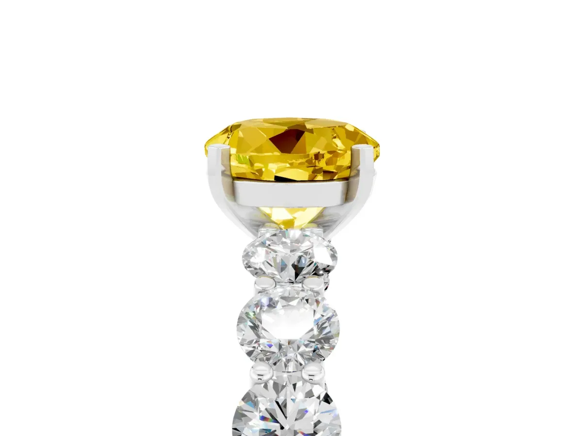 Round Cut Yellow Sapphire Prong Setting with Side Stones on a Pave Band Silver