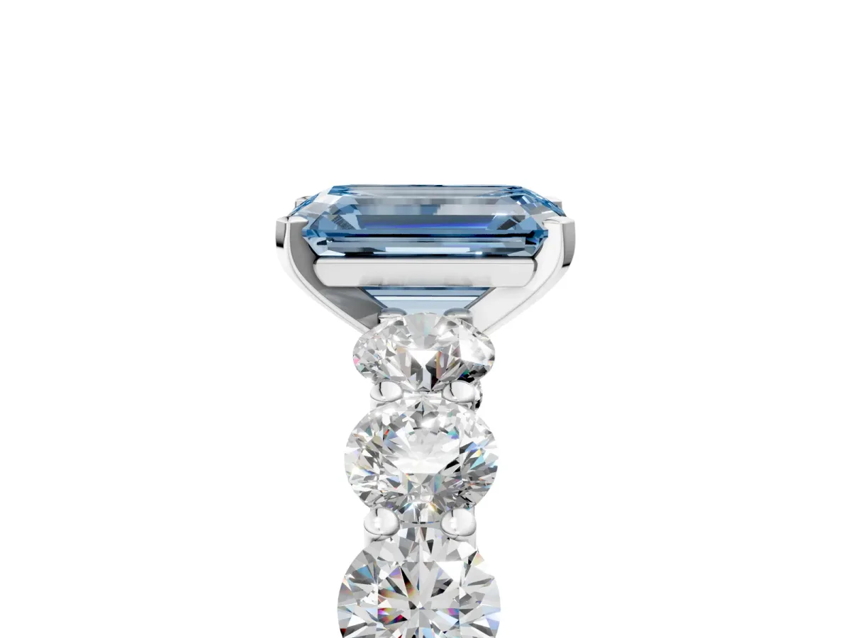 Fancy Blue Emerald Cut Diamond Prong Setting with Side Stones on a Pave Band Silver