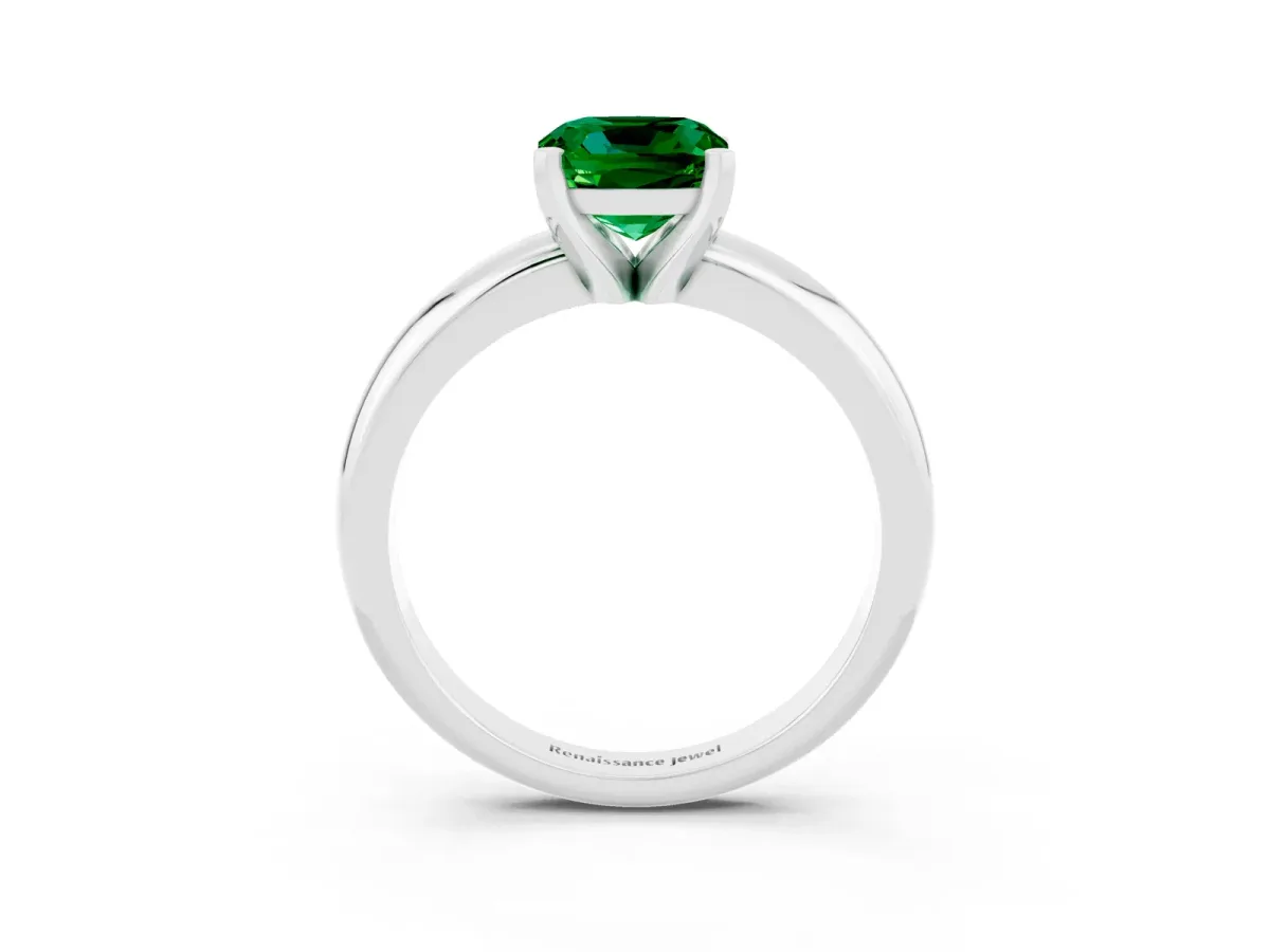 Cushion Cut Emerald Solitaire Engagement Ring with Round Band and Four-Prong Setting Silver