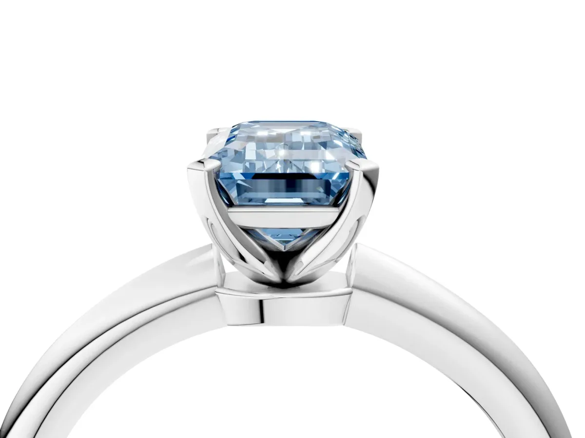 Fancy Blue Emerald Cut Diamond Solitaire Ring with Six-Prong Setting and Classic Band Platinum