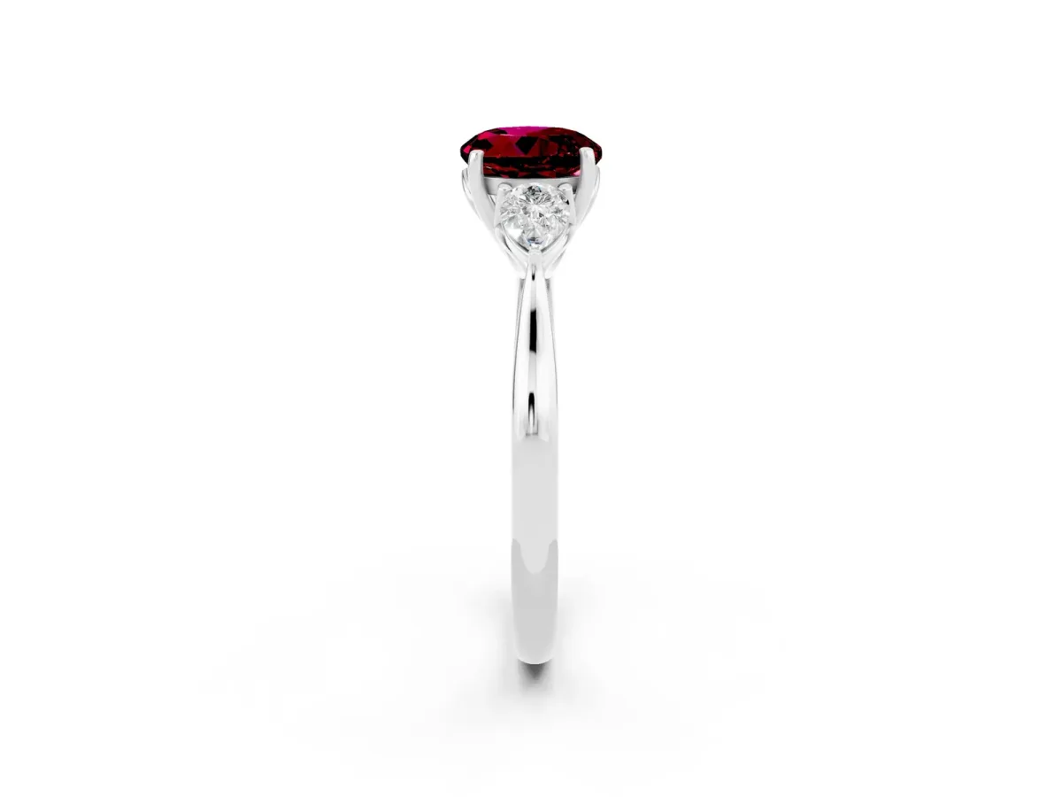 Three-Stone Round Cut Garnet Ring with Pear Side Stones in Four-Prong Setting Platinum