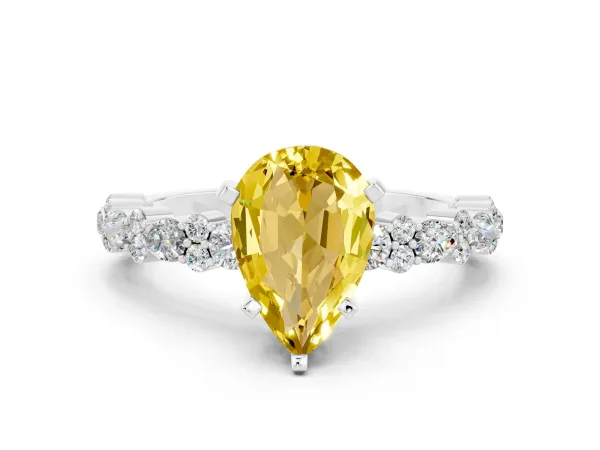 Pear Cut Yellow Sapphire Side Stone Solitaire Ring with Round and Four-Prong Setting White gold