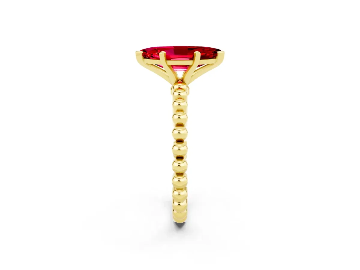 Marquise Cut Ruby Solitaire Ring with Beaded Band and Prong Setting Yellow gold
