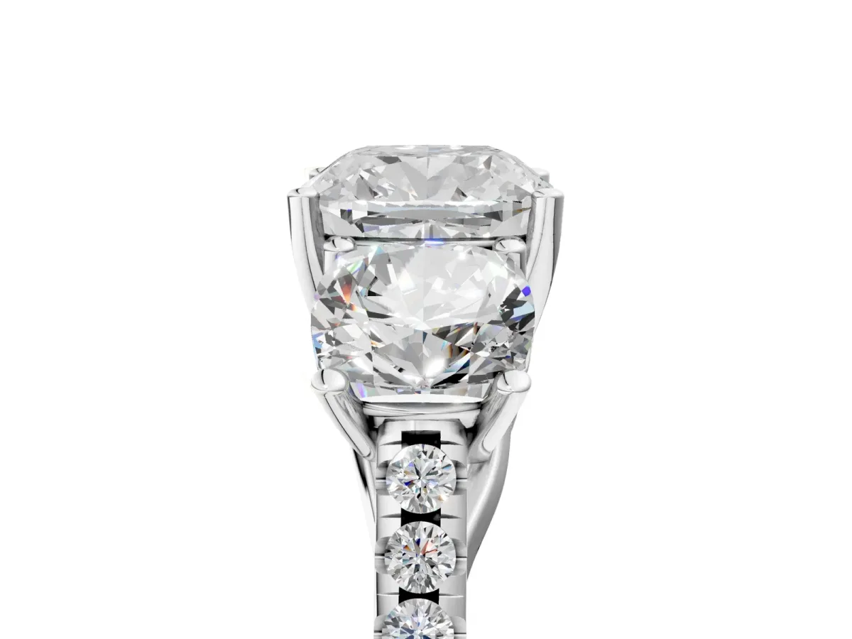 Three-Stone Cushion Cut Diamond Ring with Round Pavé Band and Prong Setting Platinum