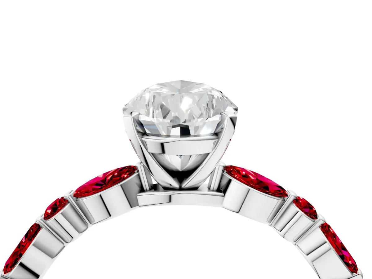 Pear Cut Diamond Ring with Marquise and Round Ruby Side Stones and Four-Prong Setting Platinum