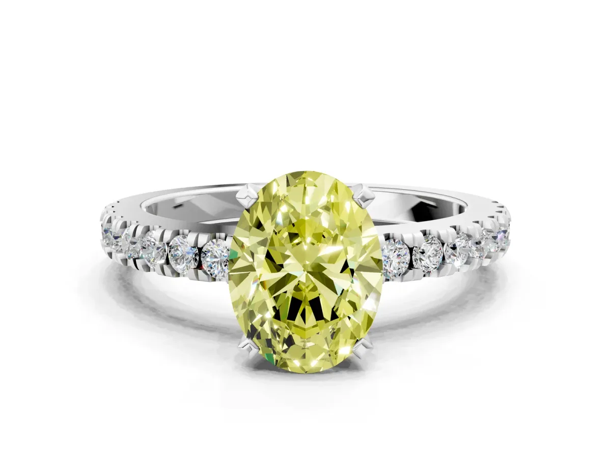 Fancy Yellow Oval Cut Solitaire Diamond with Pavé Band and Four-Prong Setting Silver