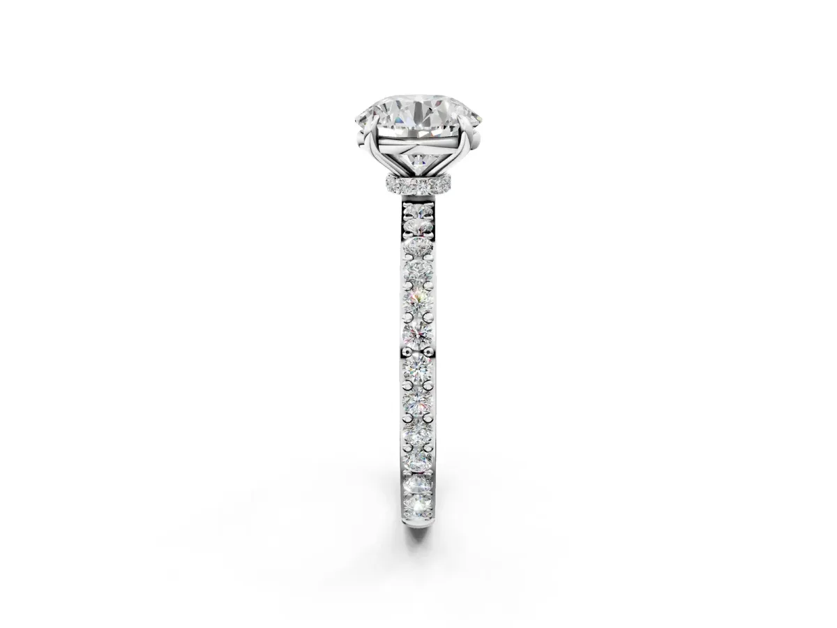 Round Cut Diamond Solitaire Engagement Ring with Pavé Band and Four-Prong Setting Silver
