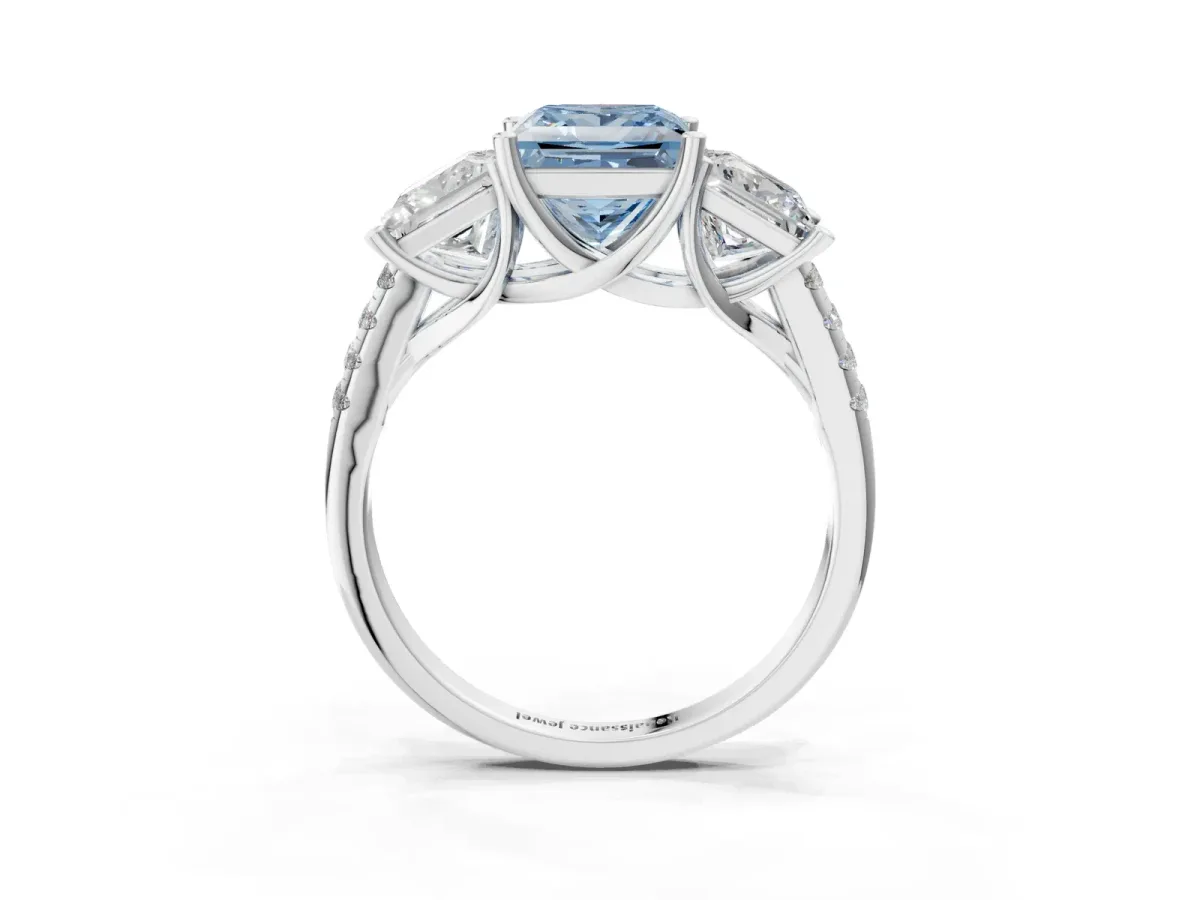 Fancy Blue Three-Stone Princess Cut Diamond Ring with Round Pavé Band and Prong Setting Silver